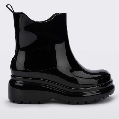 Side view of a black Melissa Grip short rain boot.