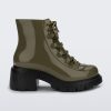 Side view of a black/green Melissa Cosmo boots with a green base, laces and a black heel sole.