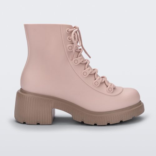 Side view of a pair of brown/pink Melissa Cosmo boots with a pink base, laces and a brown heel sole, laying on their side.