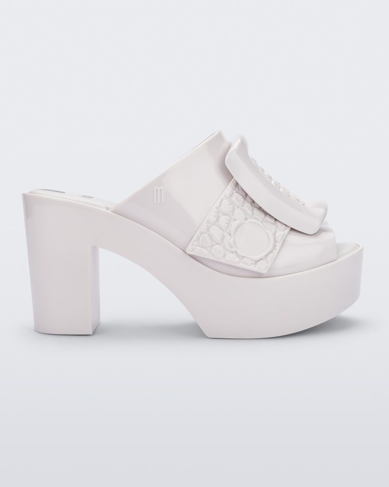 Side view of white Meilssa Buckle Up platform heel mule..