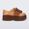 Side view of brown/beige Melissa Buckle Up Kick Off platform sneakers.