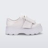 Side view of white Melissa Buckle Up Kick Off platform sneaker.