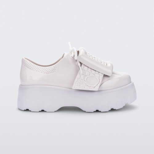 Side view of white Melissa Buckle Up Kick Off platform sneaker.