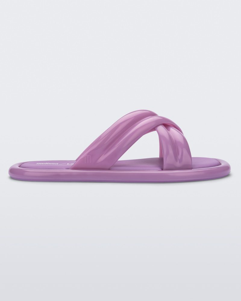 Side view of lilac Melissa Cali slides with cross straps.