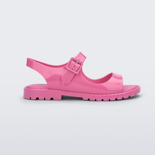 Side view of pink Melissa Bae sandals.