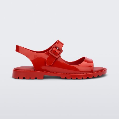 Side view of red Melissa Bae sandals.