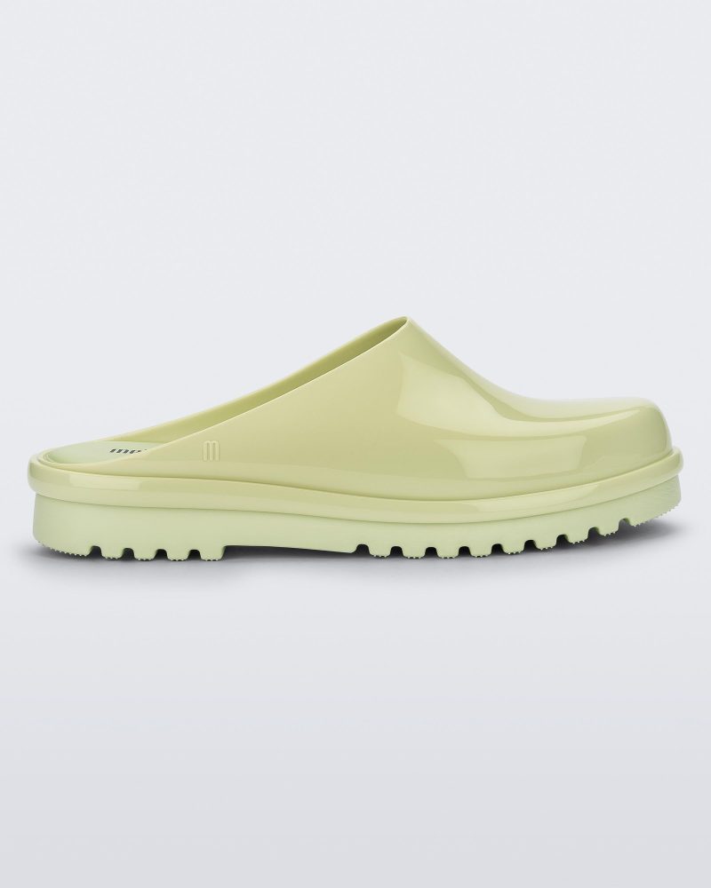 Side view of a green Melissa Smart Clog.