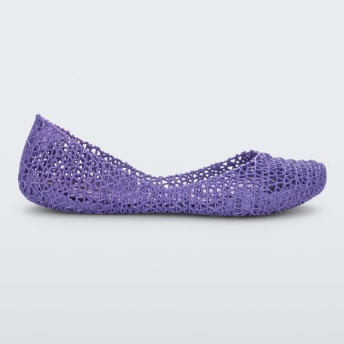 Side view of a purple Melissa Campana flat with an open woven texture.