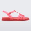 Side view of a red Melissa Party sandal with back ankle strap and buckle closure.