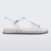 Side view of a clear Melissa Party sandal with back ankle strap and buckle closure.