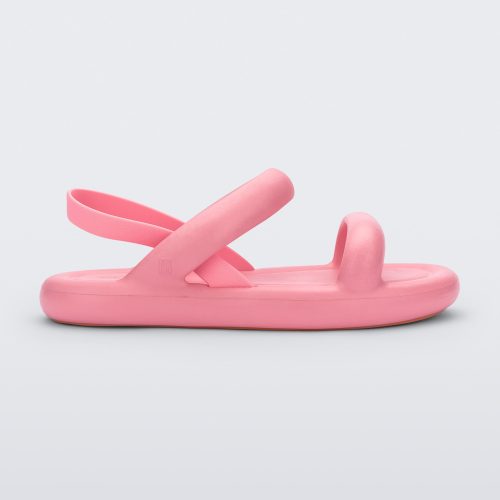 Side view of a pink Melissa Free Bloom Sandal with puffer-like straps.