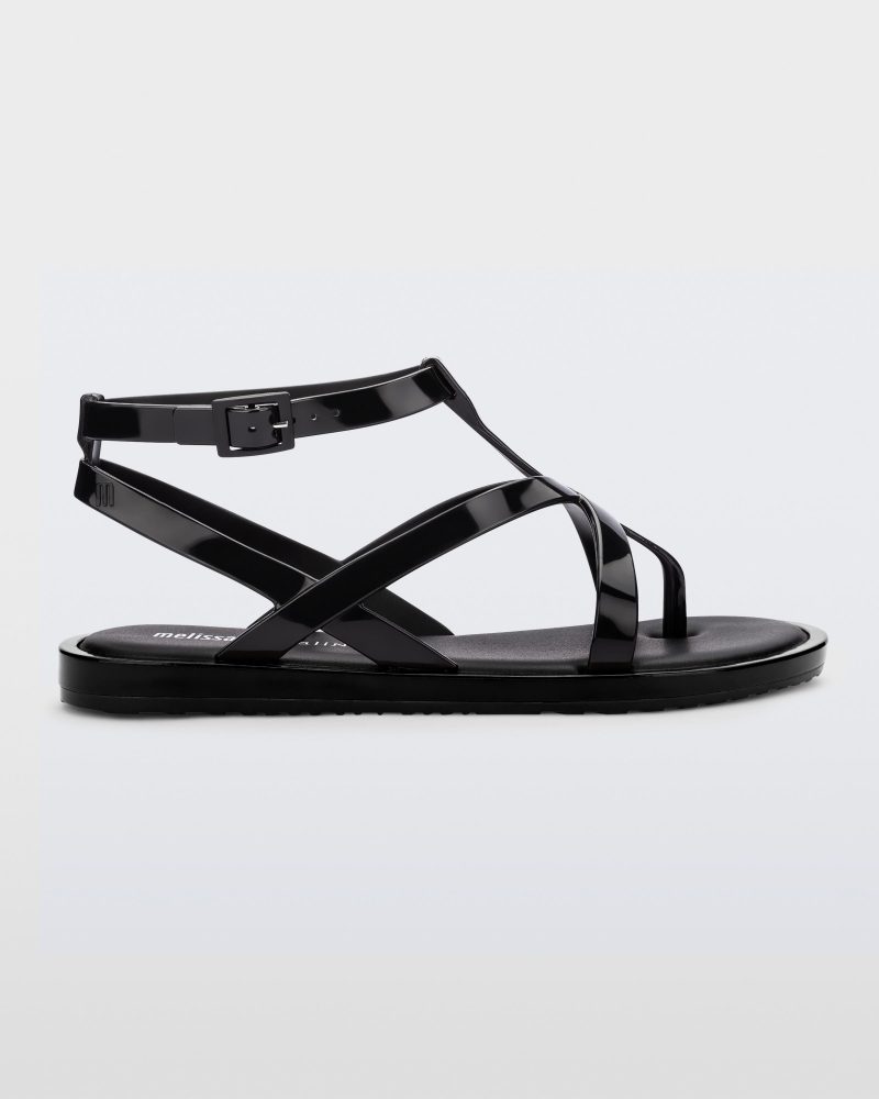 Side view of a black Melissa Cancun sandal with several straps.