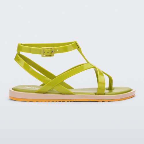 Side view of a green Melissa Cancun sandal with several straps and a beige sole.