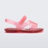 Side view of a pink/red Mini Melissa The Real Jelly Paris sandal with three front straps and a back ankle strap.