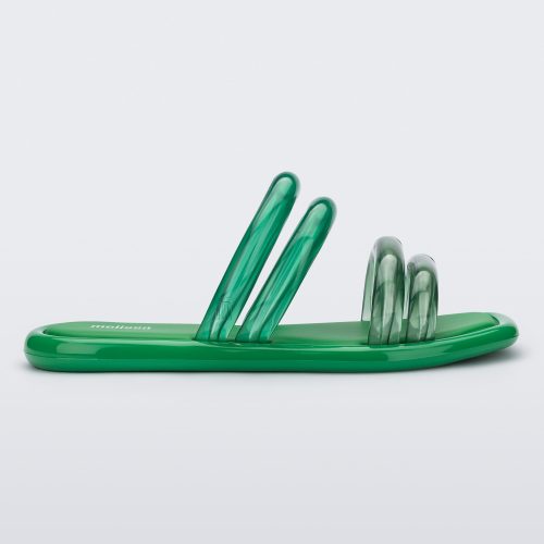 Side view of a green and transparent green Melissa Airbubble Slide.