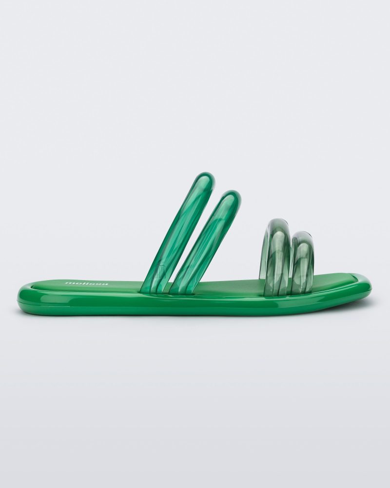 Side view of a green and transparent green Melissa Airbubble Slide.