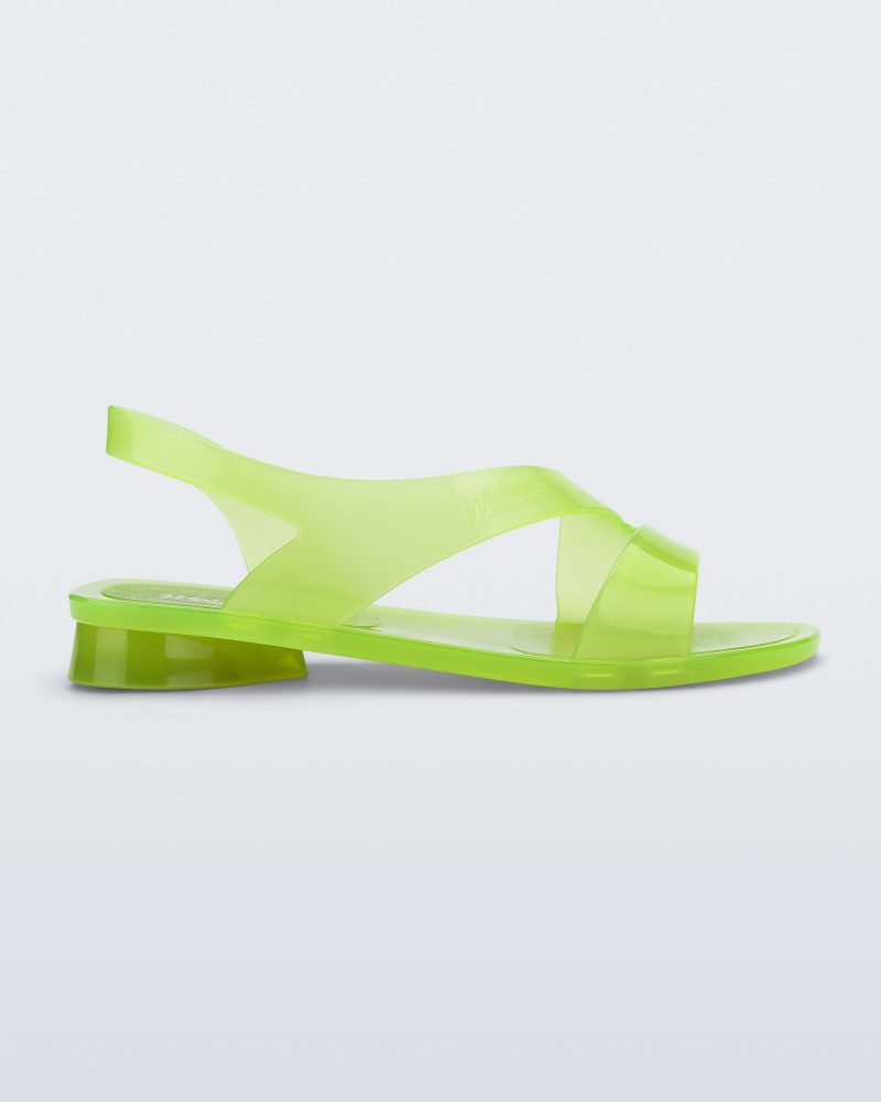 Side view of a green Melissa The Real Jelly Paris sandal with two front straps and an ankle strap.