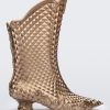 Side view of a metallic gold Melissa Court Boot with a short heel, heart detail on the front and a checkered pattern texture.