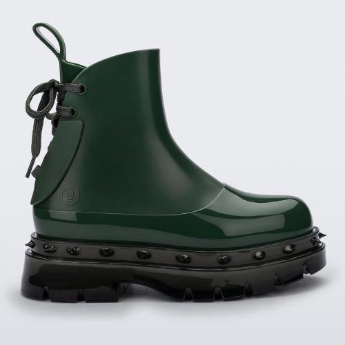 Side view of a green Melissa Spikes Boot with spike details around the sole and laces in the back.