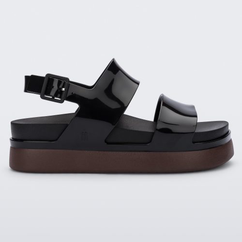 Side view of a black/brown Melissa Cosmic platform sandals with a brown sole and two black straps.