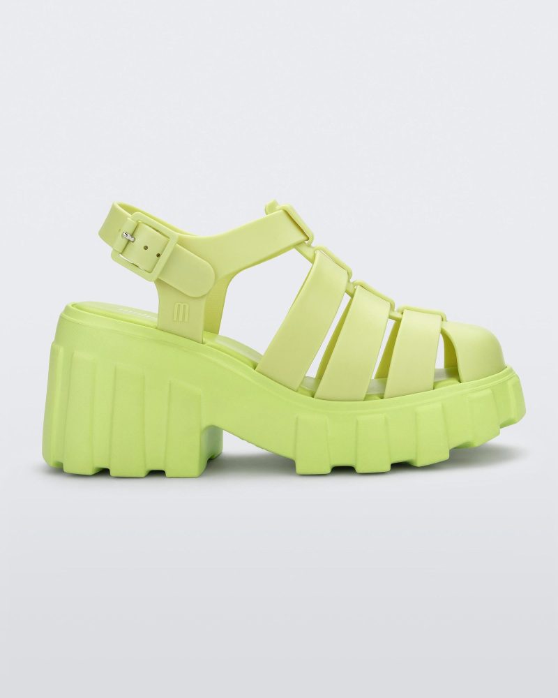 Side view of a yellow Melissa Megan platform heel sandal.