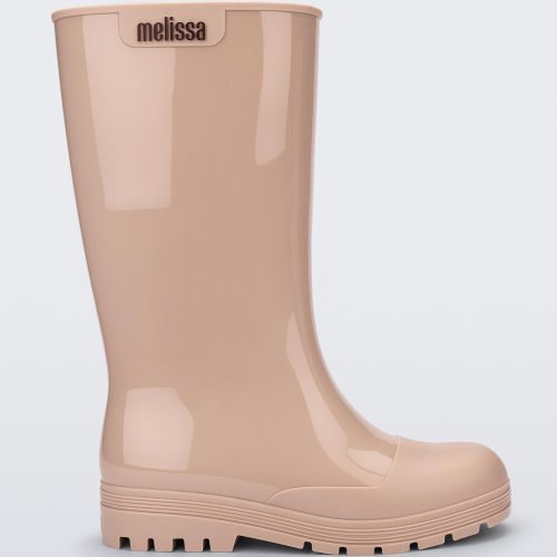 Side view of a beige Melissa Welly boot.