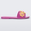 Side view of purple Melissa Babe Spring slide with yellow flowers.