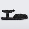 Side view of a black Melissa Papel Espadrille Campana sandal with braided sole detail and ankle strap