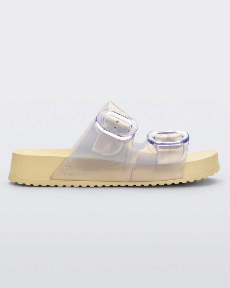 Side view of pearly yellow Cozy slide with two buckle straps.