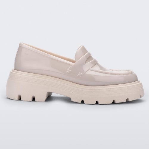 Side view of a Melissa Royal platform loafer in Beige