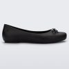 Side view of a black Melissa Aura Basic flat with a black bow.