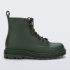 Side view of a green kids Melissa Coturno boot.