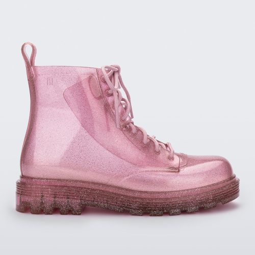 Side view of a glitter pink kids Melissa Coturno boot.