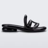 Side view of a Melissa Jelly Slides + Telfar in black.