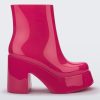 Side view of the pink Melissa Nubia platform heel boot.