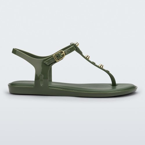 Side view of a green Melissa Solar studs sandal with gold studded t-strap and gold buckle.