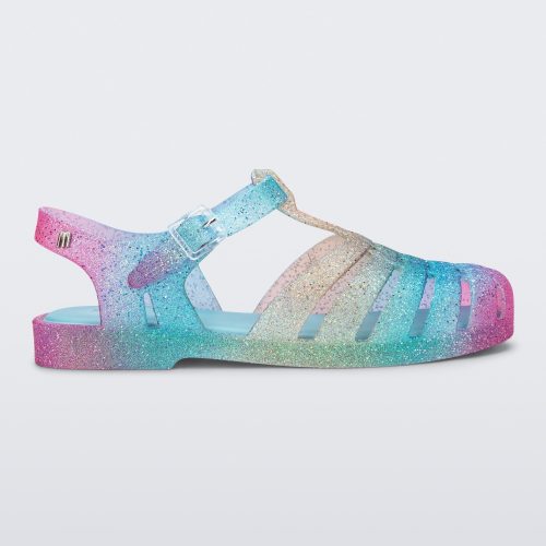 Side view of a blue and pink glitter Possession sandal.