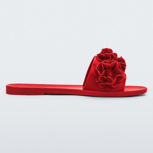 Side view of a red Babe Springtime women's slide with 3 red flowers.