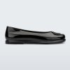 Side view of a black Ruby + Marc Jacobs flat