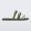 Side view of a green Eclipse Slide with glitter green straps.