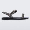 Side view of a black Eclipse Sandal with silver straps.