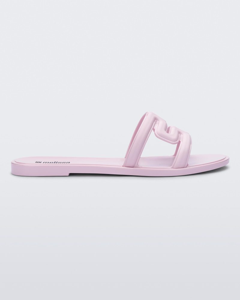 Side view of a light pink M Slide.