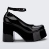 Side view of a black Melissa Doll Heel platform with ankle strap.