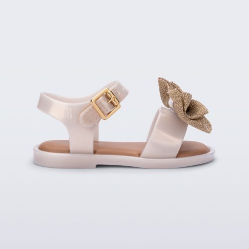 Side view of a pearly beige Mar Sweet baby sandal