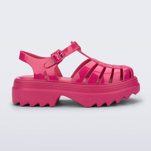 Side view of a pink Possession Platform II sandal.