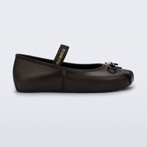 Side view of a metallic black Sophie kids ballerina flat with bow