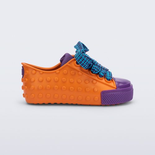 Side view of an orange and purple Polibolha baby sneaker with blue laces.