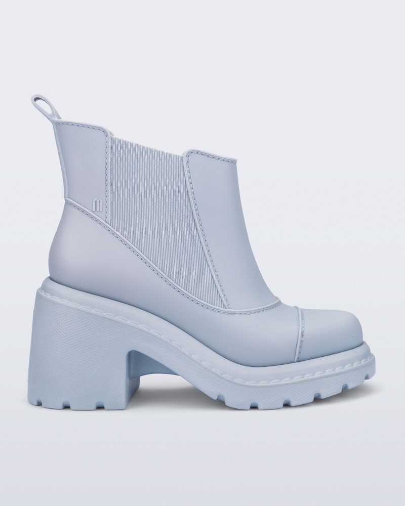 Side view of a blue Courtney boot