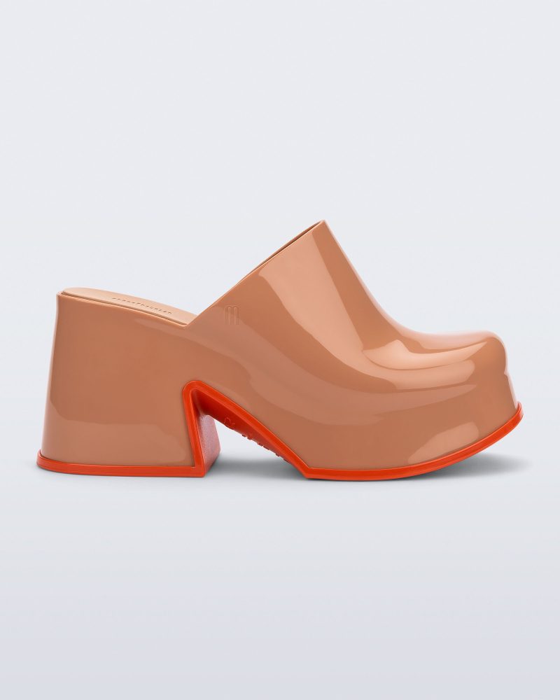 Side view of a brown Mia Platform Mule Heel with orange sole