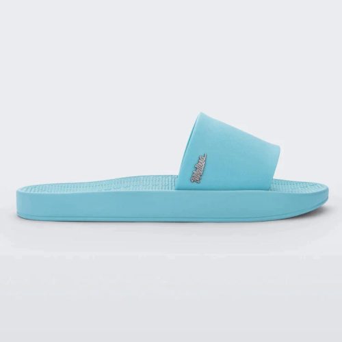 Side view of a light blue Melissa Sun Sunset slide with a 